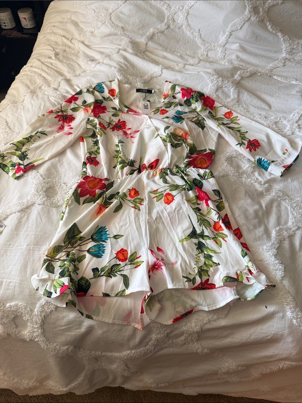 CBR Boutique White Floral V-Neck Tunic Romper